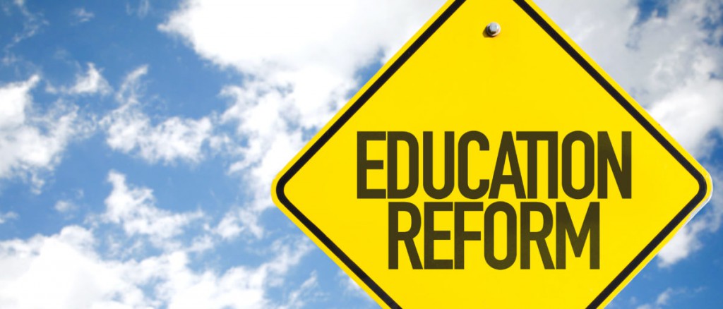 Education-Reform-sign-with-sky-background-e1526420222623
