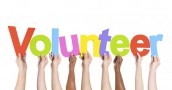 depositphotos_63075279-stock-photo-hands-holding-the-word-volunteer