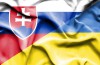 Waving flag of Ukraine and Slovak