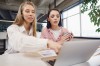 Two women entrepreneurs working together in office