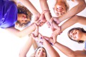 Young beautiful sportwomen doing gesture with hands