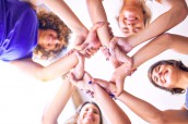 Young beautiful sportwomen doing gesture with hands