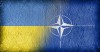 Ukrainian and NATO flag on concrete