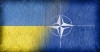 Ukrainian and NATO flag on concrete