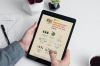 mockup-of-a-pair-of-hands-holding-an-ipad-in-a-minimalistic-scenario-2167-el1