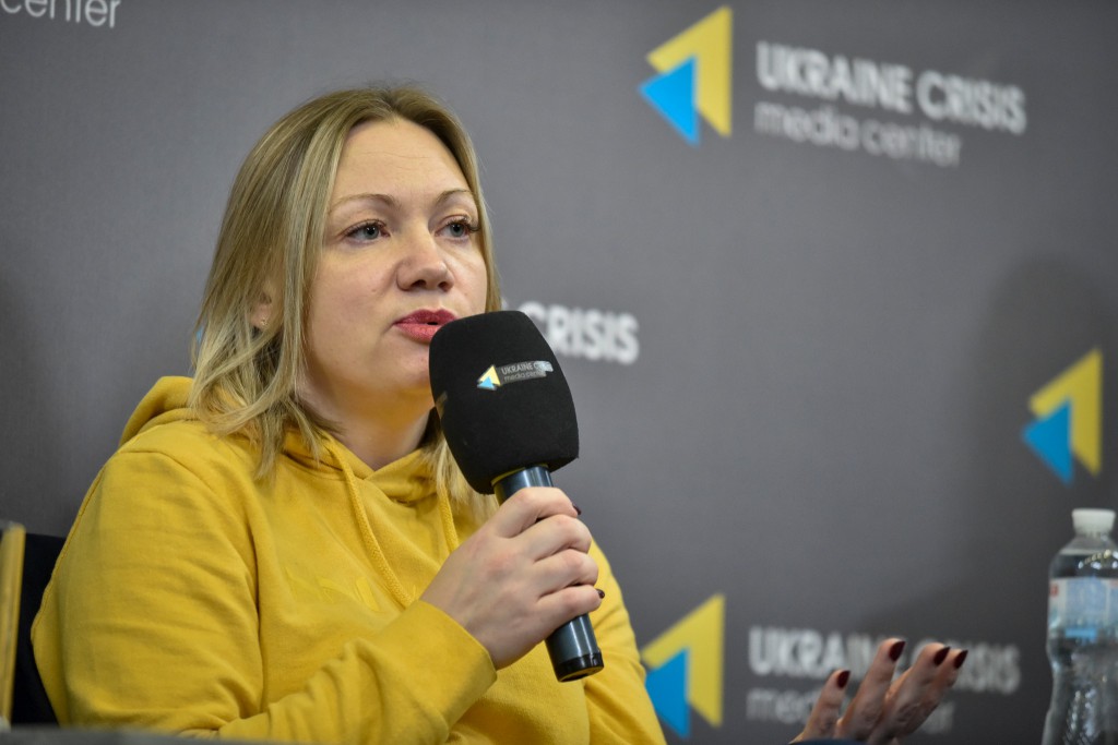 Тетяна Андрійчук - заступниця завідуючого відділом Департаменту інформації та взаємодії з громадськістю Секретаріату Кабінету Міністрів України, старший викладач Києво-Могилянської школи врядування ім. Андрія Мелешевича
