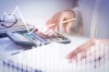 accountant-calculating-profit-with-financial-analysis-graphs (1)