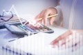 accountant-calculating-profit-with-financial-analysis-graphs (1)