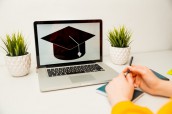 girl reading college or university application or document from school. College acceptance letter or student loan paper. Applicant filling form or planning studies.